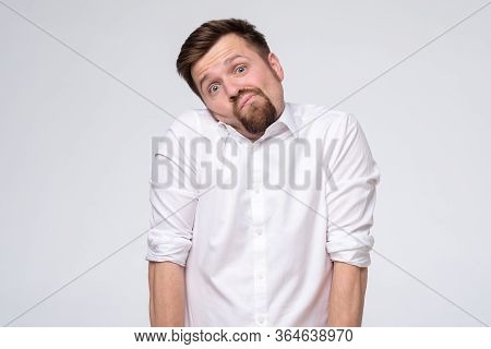 Young Businessman With Beard Has To Make A Hard Decision