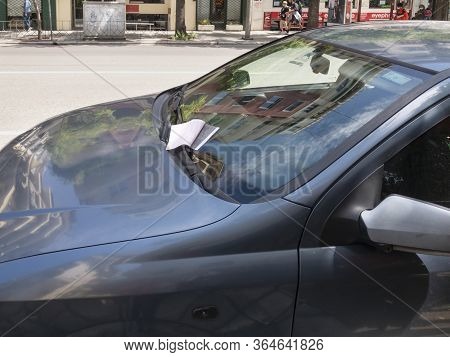 Thessaloniki, Greece - May 4 2020: Car Parking Fine Penalty Charge On Windshield. Parked Vehicle Wit