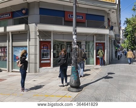 Thessaloniki, Greece - May 4 2020: Coronavirus Measures Affect Business & Daily Life. Greeks Wearing