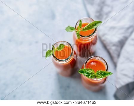 Delicious Gaspacho Soup In Glass Bottles. Traditional Spanish Cold Soup Puree Gaspacho Or Gazpacho O