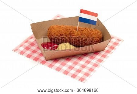 Brown Crusty Dutch Kroket With Mustard And Ketchup Isolated On A White Background