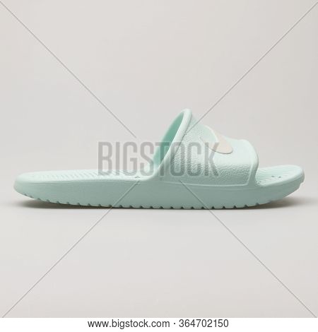 Vienna, Austria - May 27, 2018: Nike Kawa Shower Light Green Sandal On White Background.