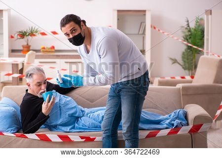 Father and son in coronavirus disease concept at home
