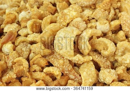 Close Up Of Pork Snack Or Pork Scratching At Market, Crispy Fried Pork Skin And Blistered Is Traditi