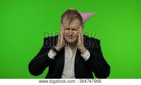 Portrait Of Drunk Young Clerk Man With A Hangover Having Headache. Emotions. Disheveled Guy Business