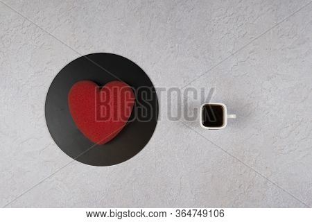 Velours Cake In The Shape Of A Heart And A Cup Of Coffee, Flat Lay. Modern French Mousse Pastry Dess