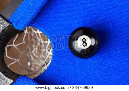 Match Ball. Black Eight Ball In The Pocket.