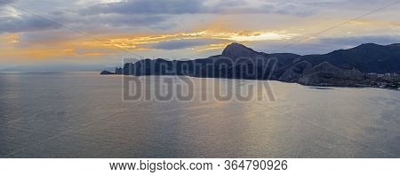 Sunset On The Black Sea Coast Of Crimea. View From The Top Of Cape Alchak To The West, Towards Novyy