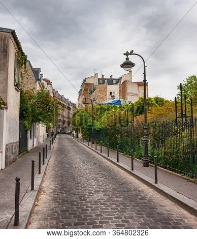 Charming Flower Quarter With Apartment Building In Paris, Rue Des Thermopyles, 14 Arrondisement. Fra