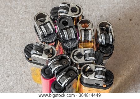 Top View On A Group Of Multi-colored Lighters