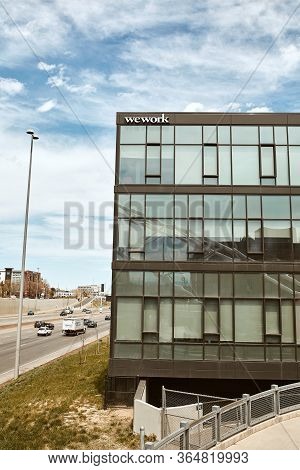 Denver, Colorado - May 1st, 2020:  Exterior Of Co-working Space, Wework Overlooking I-25 Highway, In