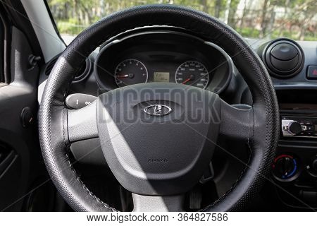 Novosibirsk/ Russia - May 02 2020: Lada Granta, Auto Interior: Steering Wheel With Red Logo  Mitsubi