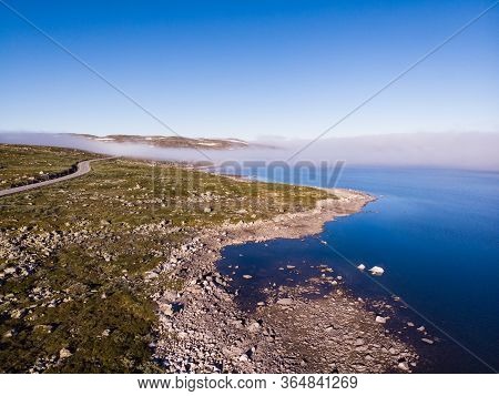 Aerial View. Road Crossing Hardangervidda Plateau, Norway Landscape. National Tourist Hardangervidda