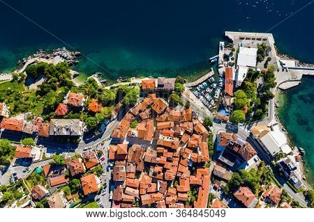 Croatia, Adriatic Coast, Beautiful Old Town Of Lovran, Historic Center And Coastline Aerial Overhead