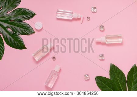 Face Skin Care Cosmetic Set Flat Lay On Pick Tropical Background. Skin Care Gel Top Horizontal View