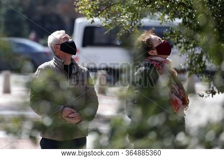Sofia, Bulgaria - 30 March, 2020: A Woman And A Man Wearing Multiple Use Protective Face Masks Durin