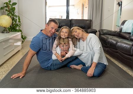 Covid-19 Stay At Home, Save Lives. Family In Staying Home Happy To Stop The Coronavirus Spreading.