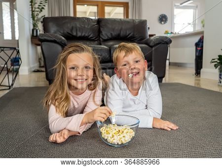 Covid-19 Pandemic - Lockdown. Stay At Home, Save Lives. Happy Caucasian Boy And Girl Together In Iso
