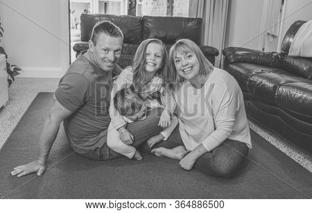 Covid-19 Stay At Home, Save Lives. Family In Staying Home Happy To Stop The Coronavirus Spreading.