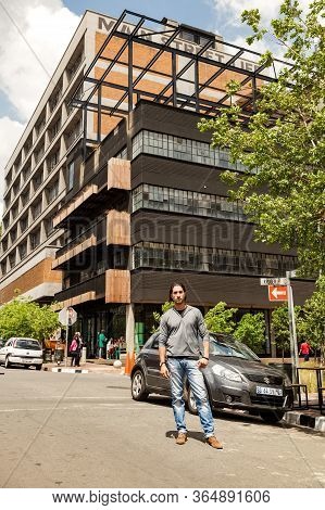 Real Estate Mogul, Jonathan Liebman Walking In Streets Of Maboneng Precinct, A Commercial And Reside