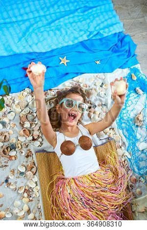 Little Girl Imitates Havaii Vacation At Home Quarantine.