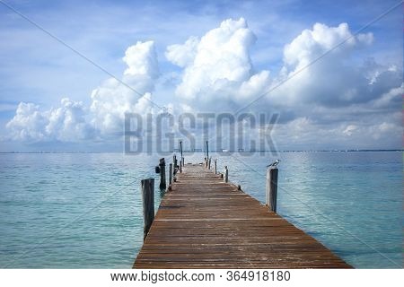 Wooden Bridge On The Tropical Beach Background.  Isal Mujeres Mexico. Tropical Holiday Banner. Trave