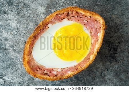 Close Up Of Rustic Traditional English Comfort Pub Food Scotch Egg