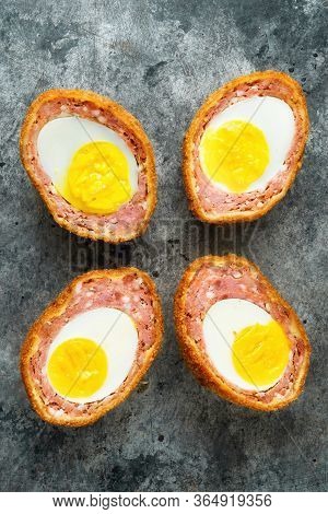 Close Up Of Rustic Traditional English Comfort Pub Food Scotch Egg