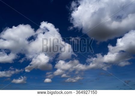 View Of Blue Sky Background With Clouds.