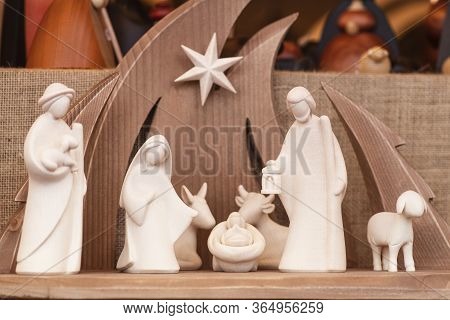 Christmas Nativity Scene Wooden Figurines Inside A Wooden House Representing The Holy Family