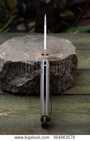 Open Knife. Lightweight Knife Handle Shape. View Of The End Face Of The Knife. Butt Blade. Knife On 