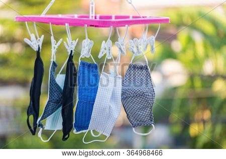 Wash The Face Mask And Dry In The Air. Handmade Own Masks To Protect From Dust Pollution And Virus E