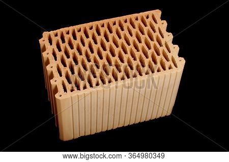 Ceramic Building Block Isolated On The Black Background
