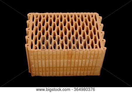 Ceramic Building Block Isolated On The Black Background