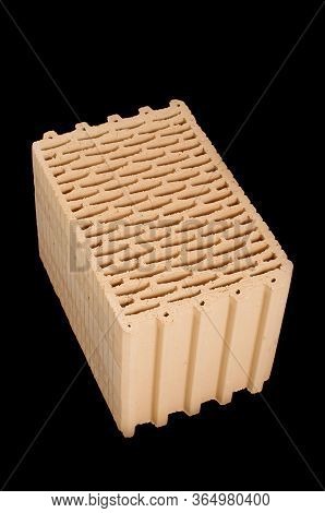 Ceramic Building Block Isolated On The Black Background