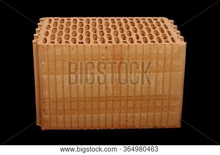 Ceramic Building Block Isolated On The Black Background