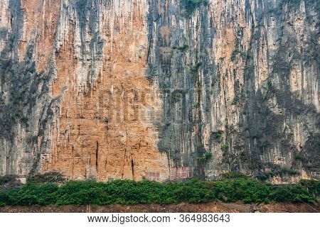 Baidicheng, China - May 7, 2010: Qutang Gorge On Yangtze River. Closeup Of Straigth Down Brown Cliff