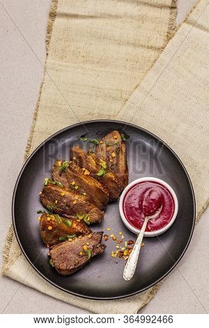 Roast And Braised Duck Breast With Sweet And Sour Berry Sauce