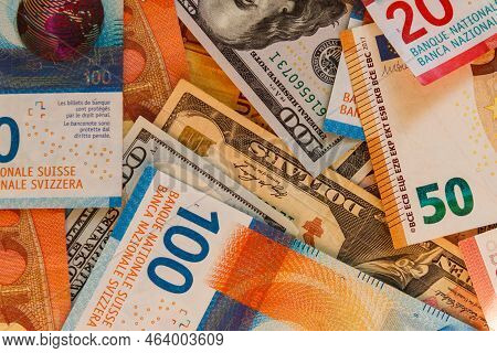 Multicurrency Background Of Us Dollars, Euros And Swiss Francs