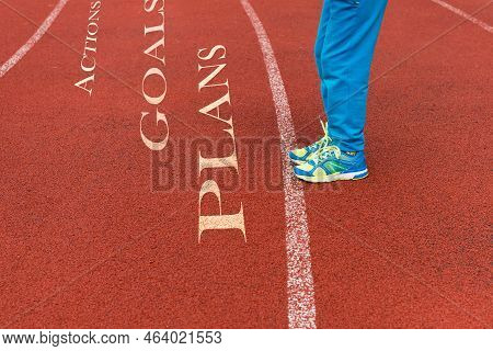 Legs In Front Of Goals, Plans, Actions On The Red Treadmill.