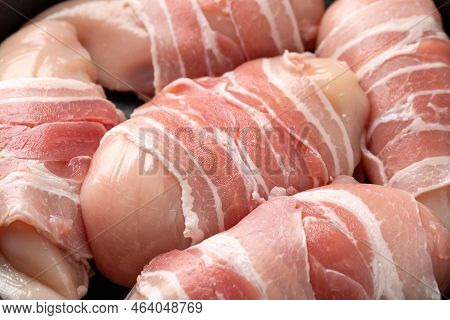 Raw Chicken Breast Wrapped In Bacon. Ready To Cook
