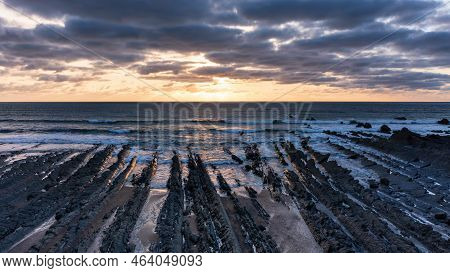 Beautiful Aerial Drone Landscape Sunset Image Of Welcombe Mouth Beach In Devon England