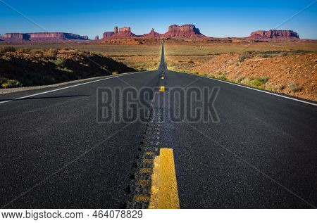 Highway Road U.s. Highway 163 And Monument Valley At Sunset, Arizona, Usa