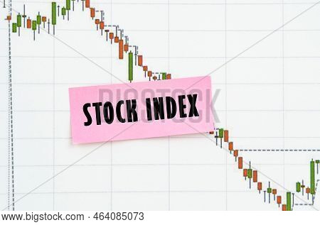 Business And Trading Concept. Against The Background Of The Quote Chart, A Sticker With The Inscript