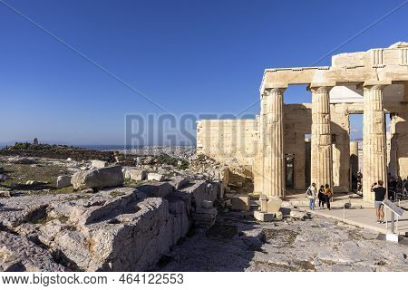 Athens, Greece - October 17, 2022: The Group Of Tourists In Front Of Propylaia, Monumental Ceremonia