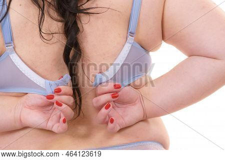 Fat Woman Rear View Opening Taking Off Or Putting On Her Bra. Plus Size Overweight Female Wearing Li