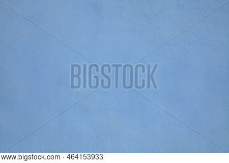 Blue Or Sapphirine Wall, Texture, Background. The Building Wall, Painted With Water-based Paint. Smo