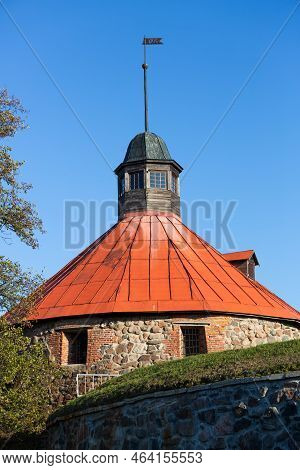 Korela Fortress In Priozersk, Russia. Stone Tower On The Background Of Blue Sky. Autumn Landscape Wi