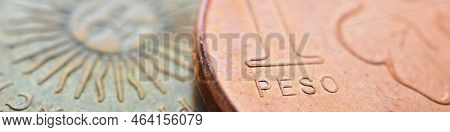 Coin Of 1 Argentine Peso Closeup. One Peso Coins Of Argentina. News About Economy Or Banking. Loan A
