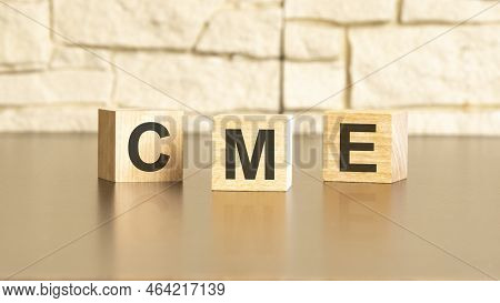 Cmetext From Wooden Blocks On A Gray Stone Background